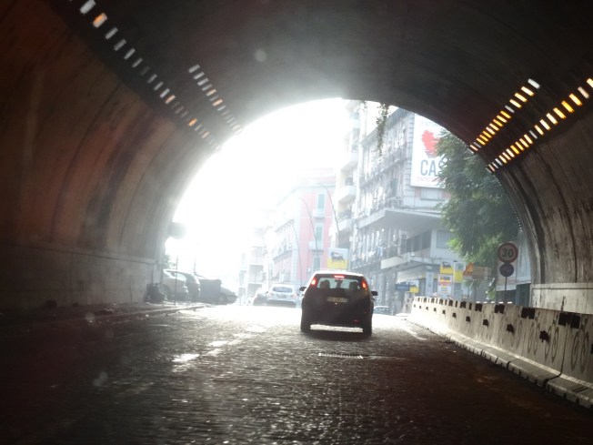 A quiet moment in one of the large cobbled tunnels that lead in and out of the centre of Naples 