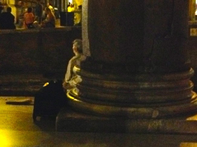 A night view of the base of one of the granite columns in the portico of the Pantheon