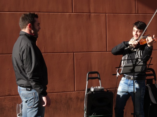 A busker in Naples, Italy