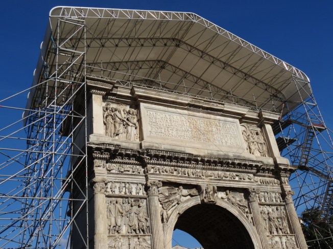 The faded triumph of Trajan's Arch in Benevento