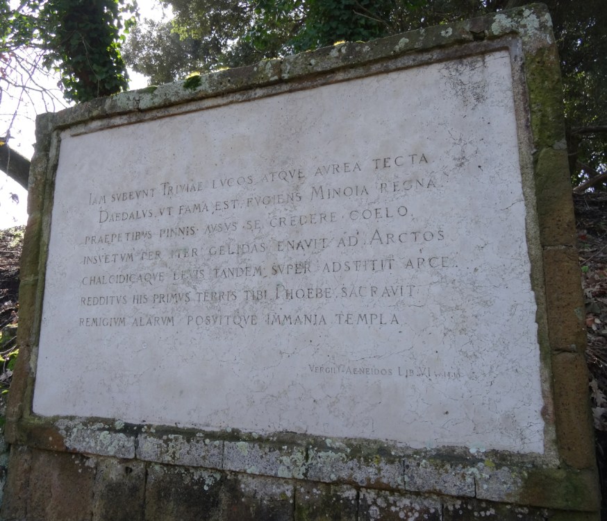 Presently, they drew near to the grove of Hecate with her golden shrine. Deadalus, so the story goes, fleeing Minos's kingdom and daring to entrust himself to the heavens, floated out on swiftly driving wings along an unwonted path to the icy Greater and Lesser Bears. At last he hovered lightly over the Chalcidian citadel. Restored to these lands, Phoebus, he first dedicated to you the wings that had propelled him and established an awesome temple.