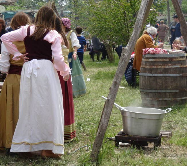 Students prepare food at the 'Sagra delle Antiche Taverne' in Licola, Campania