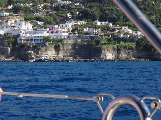 Sailing past the steep sides of Ischia