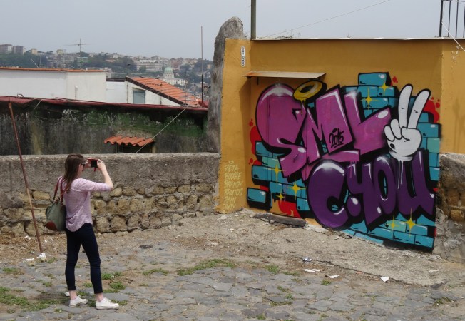 Eliza with her camera in Naples, Italy