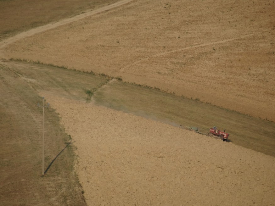 Tracked tractor at work on the steep hills