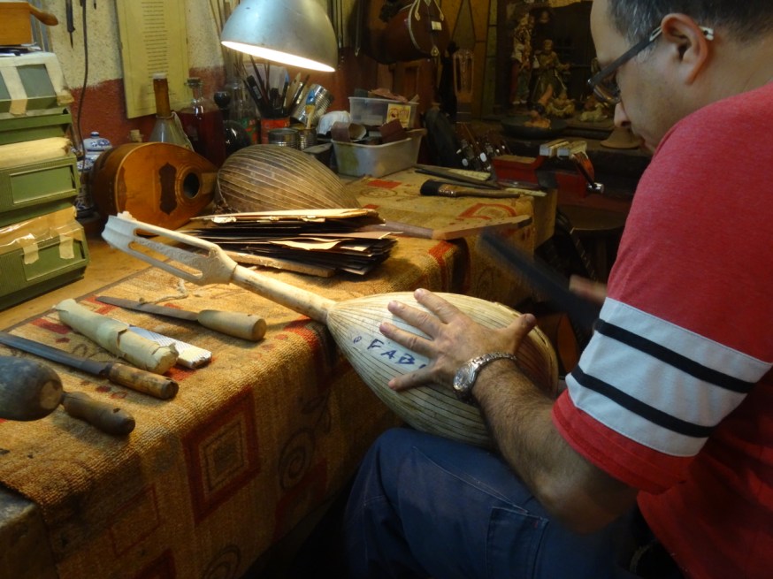 Demonstration of the techniques used to make a mandolin in 'La Bottega del Mandolino' in Naples, Italy
