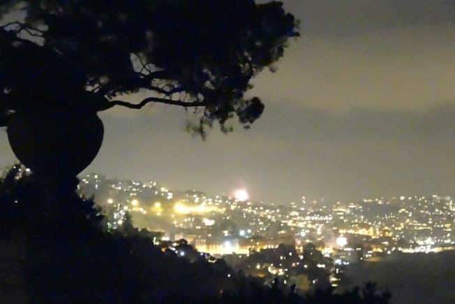 Fireworks around the Bay of Naples seen from Posillipo