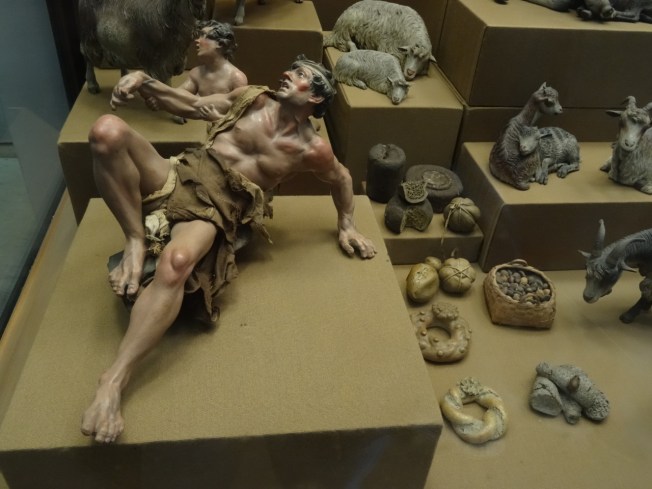 Small figure of a crippled beggar and child by Giuseppe Sanmartino (1720 - 1793) who sculpted the life-size Cristo Velato (Veiled Christ) also in Naples, Italy