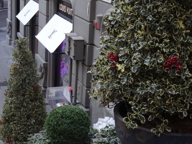 Louis Vuitton and the steps that lead up from the store in Via dei Mille in Naples, Italy