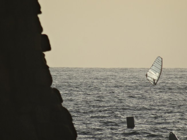 Sail at the edge of Castel dell'Ovo, Naples, Italy