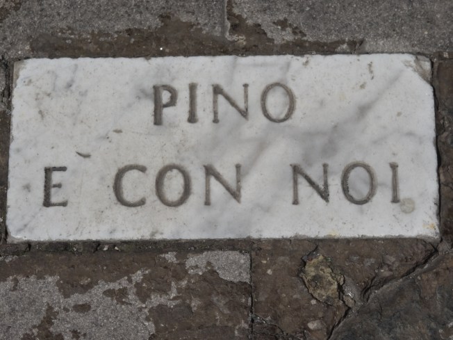 Memorial to Pino Daniele - one of the pavement stones that carry his name. This one is along the seafront in Naples, Italy