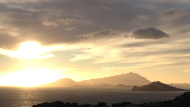 View from Parco Virgiliano towards Capo Miseno and on to the islands of Procida and Ischia. In the Aeneid the trumpeter Misenus dies off Capo Miseno which then took his name.