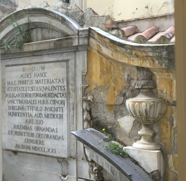 View through a window at the MADRE on to the ancient walls of its neighbour, Santa Maria Donnaregina Vecchia