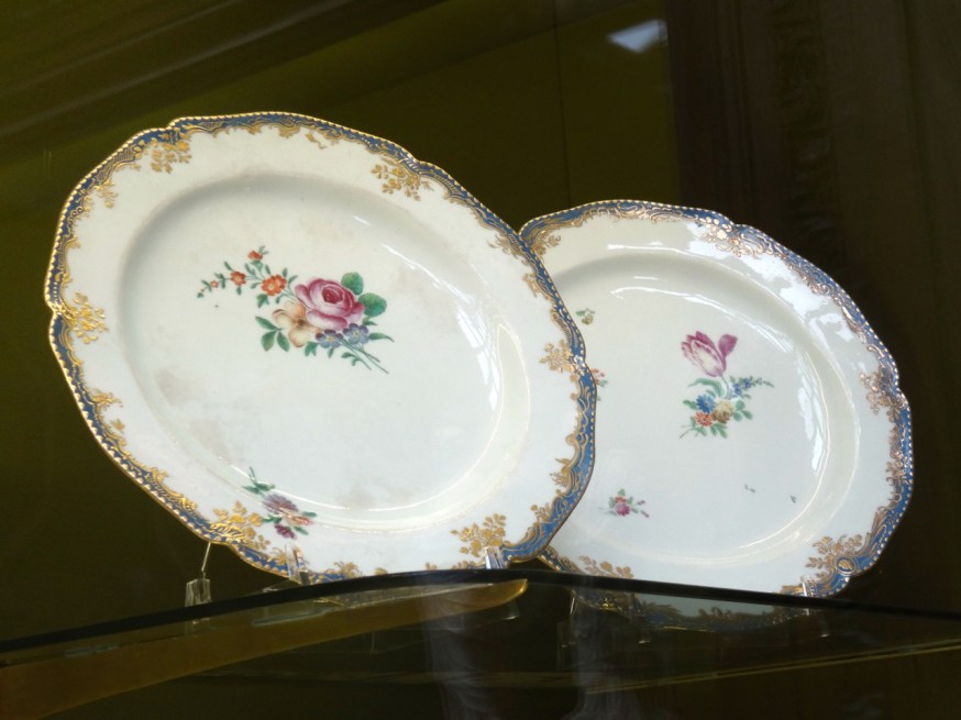 Two plates, rare survivors we were told of a Capodimonte porcelain dinner service