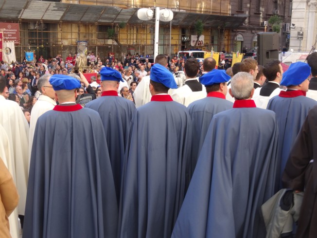 Waiting for San Gennaro outside the Duomo in Naples, Italy