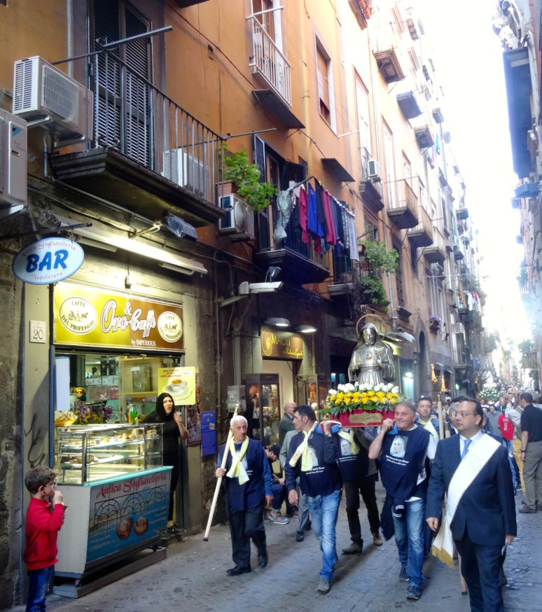 Accompanying the procession of saints through Naples, Italy