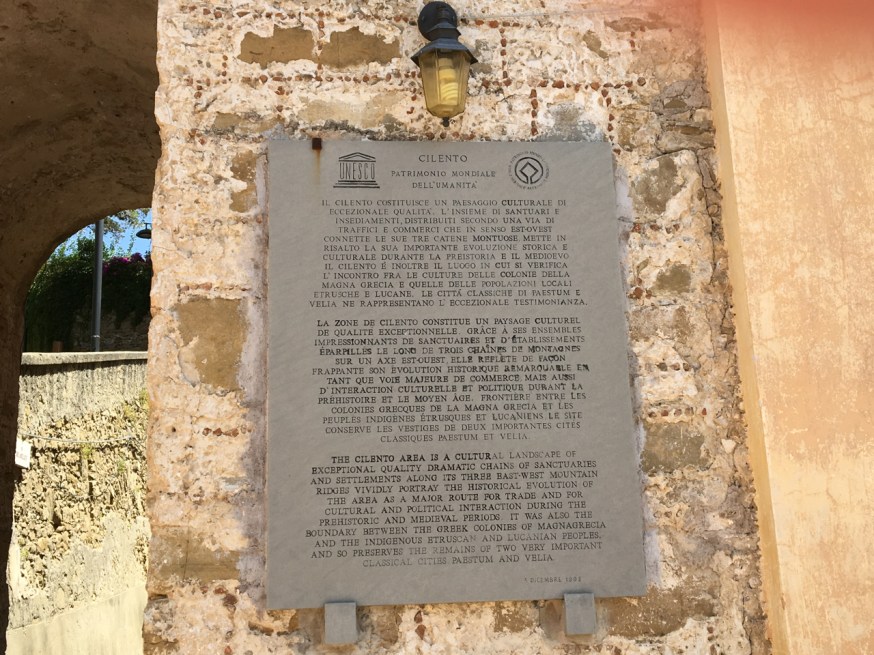 A plaque in Castellabate describing the importance of the Cilento area as a UNESCO World Heritage Site: "... a cultural landscape of exceptional quality ..."