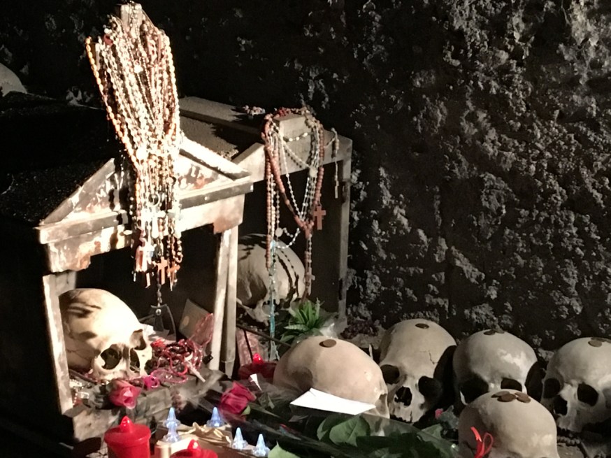 Skulls singled out for particular attention in the Cimitero delle Fontanelle in Naples, Italy
