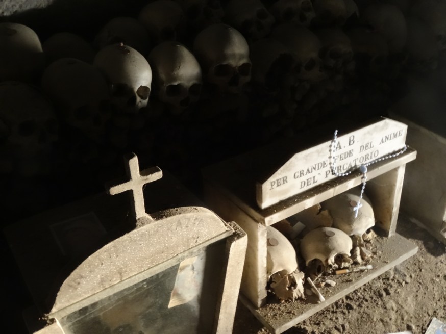 Skulls singled out for particular attention in the Cimitero delle Fontanelle in Naples, Italy