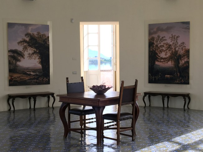 To the front of the Casina Vanvitelliana are views to the sea and the island of Ischia