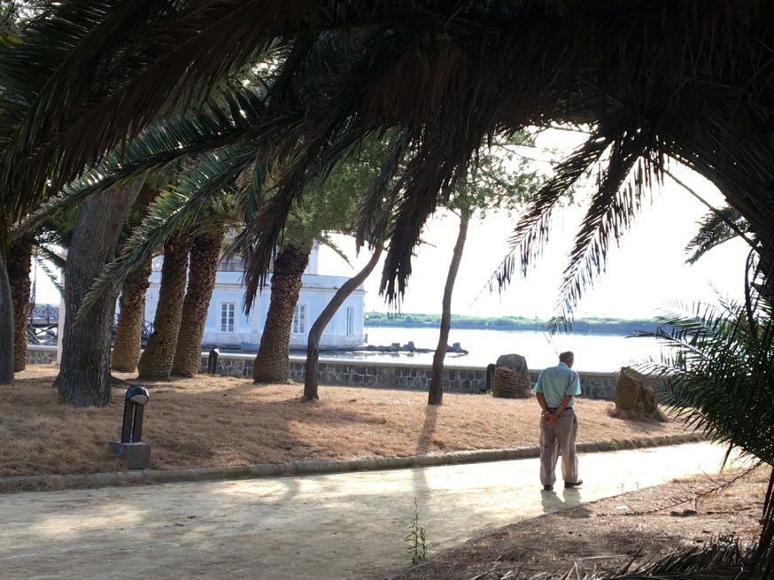 A glimpse of the Casina Vanvitelliana through the trees of its park