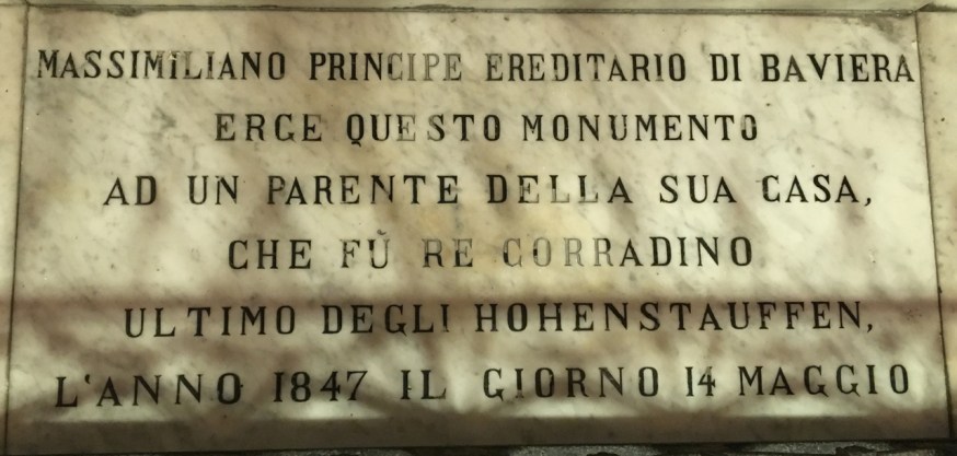 A plaque at the foot on the statue of Conradin in the church of San Carmine in Naples, Italy. "King Corradino - last of the Hohenstauffens"