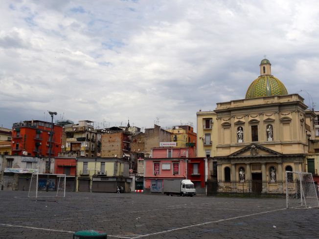 The Piazza del Mercato in Naples Italy - the church behind the football posts is called Santa Croce e Purgatorio and has been closed since the earthquake in 1980. This is the church that first marked the spot where Conradin was killed.