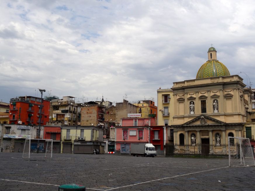 The Piazza del Mercato in Naples Italy - the church behind the football posts is called Santa Croce e Purgatorio and has been closed since the earthquake in 1980. This is the church that first marked the spot where Conradin was killed.
