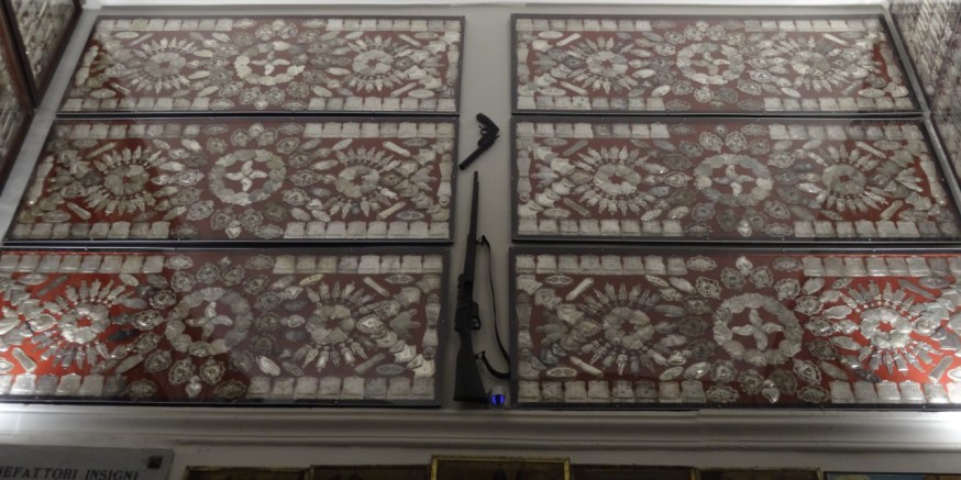 On the walls of Santa Maria del Carmine in Naples, Italy