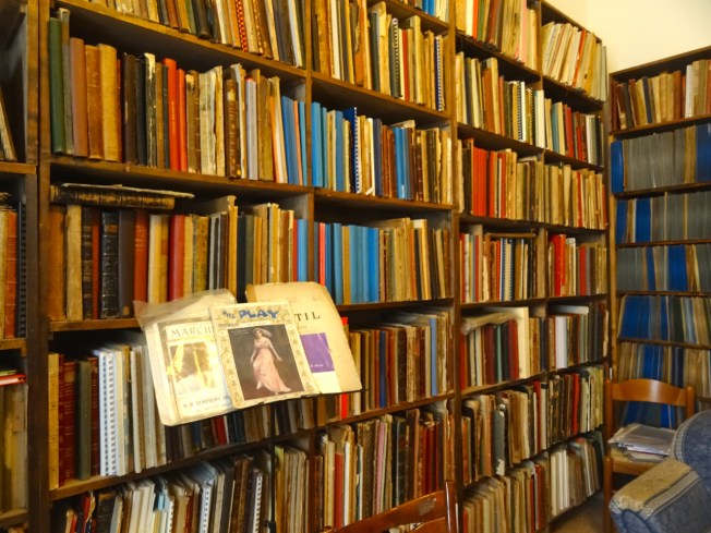 A small section of bookcase carrying part of Michael Aspinall's collection of musical scores and literature