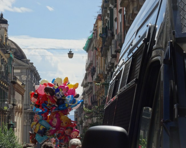 Riot vans and balloons - the Feast of San Gennaro in Naples, Italy