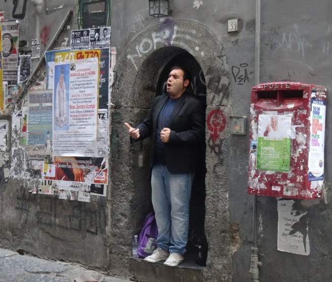 A busker in Naples, Italy