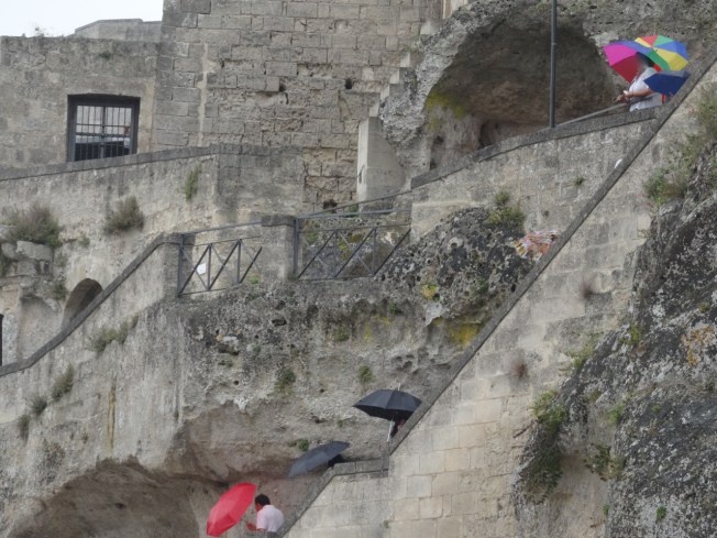A sprinkle of tourists in Matera in Basilicata in Italy