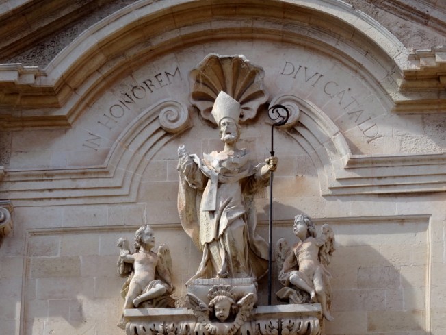 Decoration above the door into the Cathedral of San Cataldo in Taranto, in Puglia, Italy