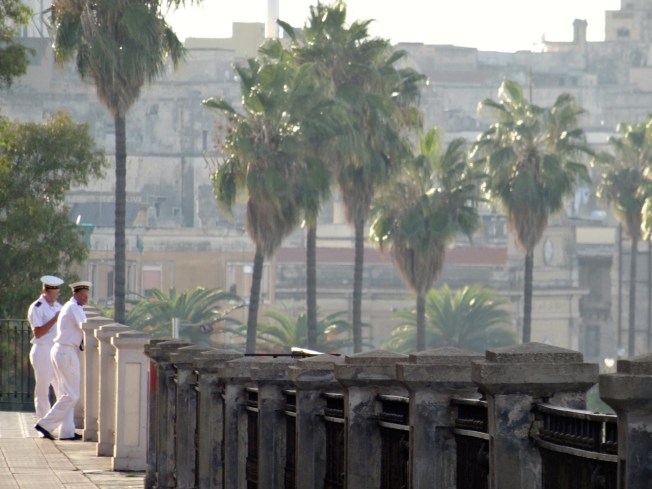 Sailors, taking a break in Taranto, in Puglia, Italy