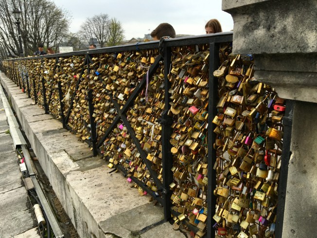 Looking at love on the Seine in Paris, France