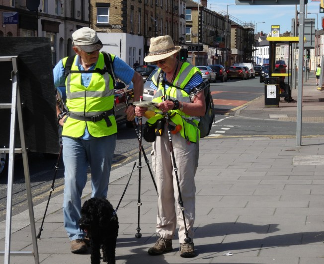 Tom and Jane Benyon, and Moses the dog in the outskirts of Liverpool