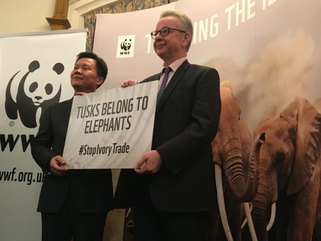 Deputy Director General of Northeast Tiger Leopard National Park Authority, Zhang Shanning, and the Rt Hon Michael Gove MP Secretary of State for Environment, Food and Rural Affairs