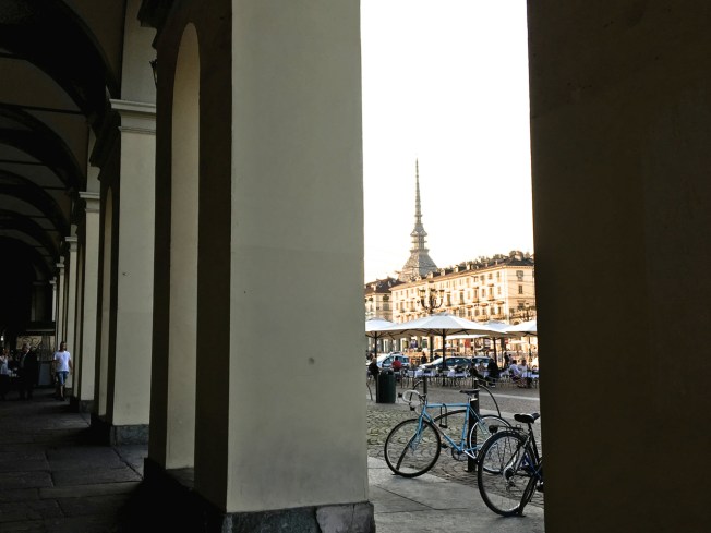 One of the covered walkways that run down either side of huge Piazza Vittorio Veneto in Turin, Italy