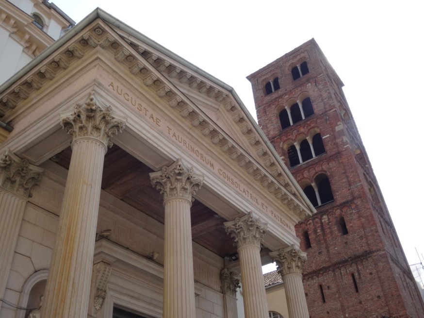 Santuario della Consolata, and the Torre Campanaria (bell tower) di Sant'Andrea in Turin, Italy