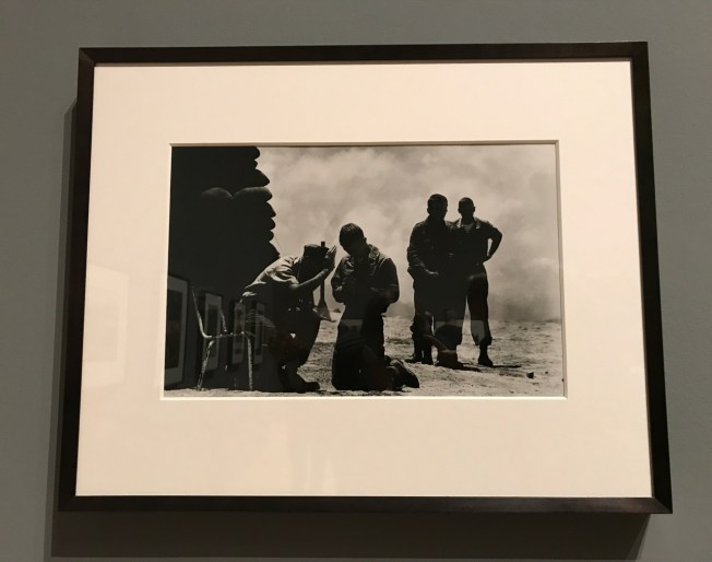 Don McCullin - On a hill in Da Nang a priest hears soldiers' confessions 1969